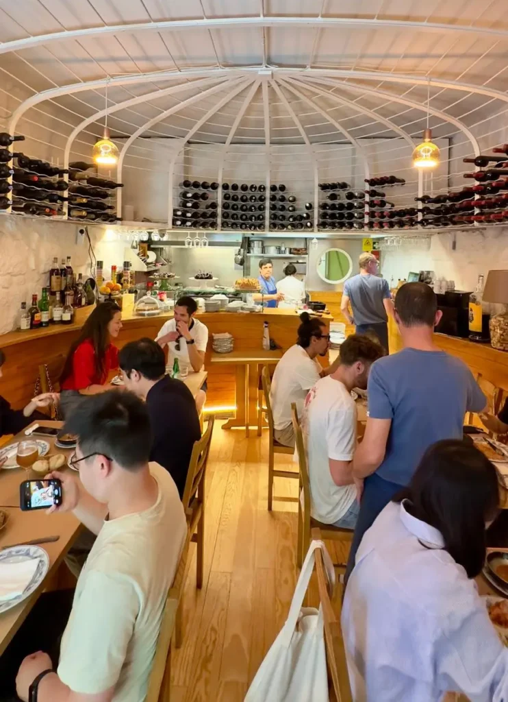 Internal view of Taberna Dos Mercadores, a traditional Portuguese restaurant in Porto