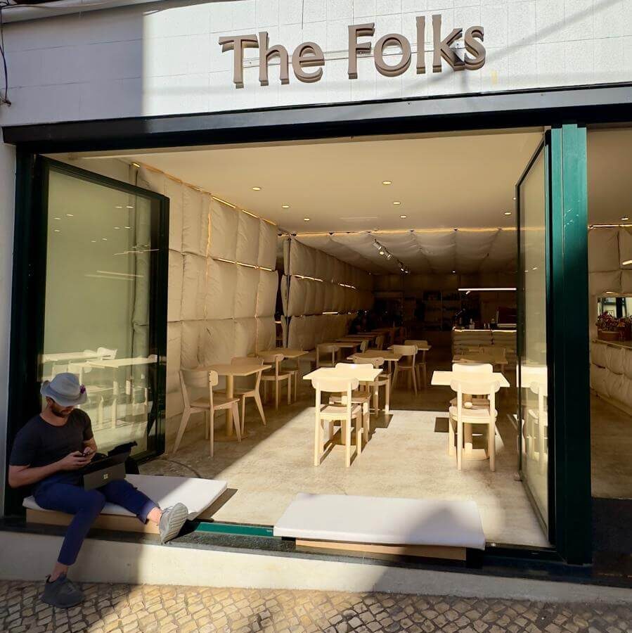 The Folks, a renowned coffee shop in Lisbon, offering a warm and inviting dining experience.