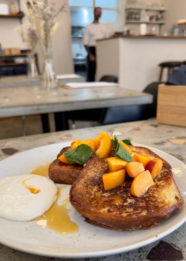 French Toast served with honey, apricot, whipped cream