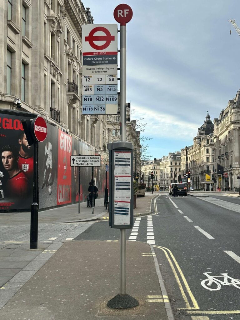 London Bus Stop pole indicating routes and destinations